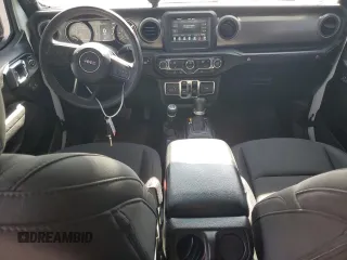 2023 Jeep Gladiator Sport S with VIN 1C6HJTAG4PL556387, listed as a Copart auction lot 47453305 with 35,611 mi miles and Salvage title. Bid and sale history available at DreamBid. Image 8.