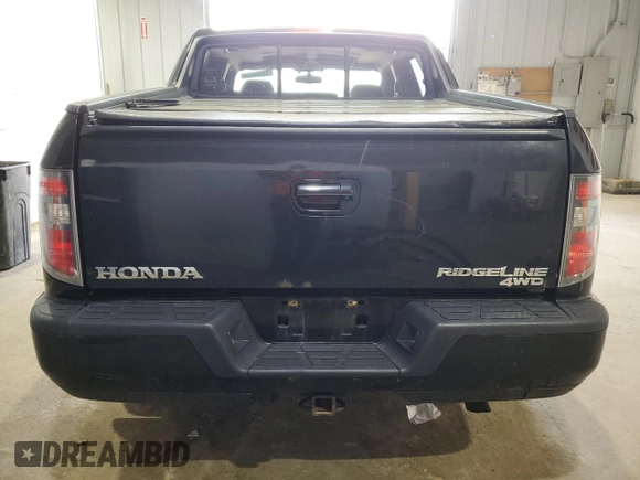 2013 Honda Ridgeline RTL with VIN 5FPYK1F57DB008861, listed as a Copart auction lot 55998335 with 226,567 mi miles and Salvage title. Bid and sale history available at DreamBid. Image 6.