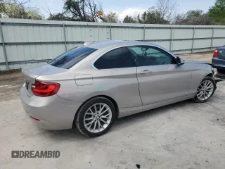 2015 BMW 2 Series 228i with VIN WBA1F5C51FV257605, listed as a Copart auction lot 50991415 with 122,396 mi miles and Salvage Title. Bid and sale history available at carsss.com. Image 3.