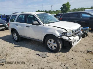 2009 Ford Escape XLS z VIN 1FMCU02779KB08396, wystawiony jako Copart lot #80984104 z przebiegiem 194 743 mil mil oraz Szkoda całkowita • Salvage title. Historia ofert i sprzedaży dostępna na DreamBid. Obrazek 4.