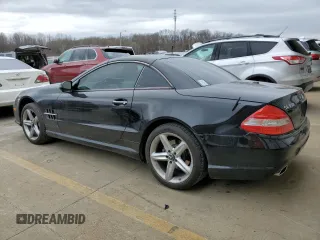 2009 Mercedes-Benz SL 550 with VIN WDBSK71F09F143389, listed as a Copart auction lot 49651665 with 110,204 mi miles and Salvage title. Bid and sale history available at DreamBid. Image 2.