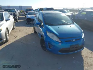 2012 Ford Fiesta SE with VIN 3FADP4EJ6CM131947, listed as a IAAI auction lot 41013636 with 148,195 mi miles. Bid and sale history available at carsss.com. Image 1.