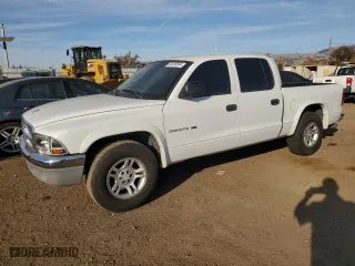 2002 Dodge Dakota SLT with VIN 1B7HL48NX2S560486, listed as a Copart auction lot 84499894 with 277,151 mi miles and Clean Title. Bid and sale history available at carsss.com. Image 1.
