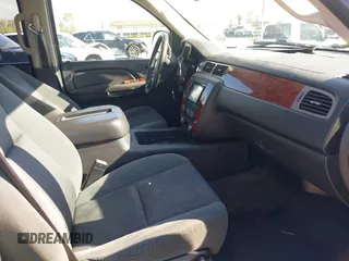 2009 Chevrolet Tahoe 2LT z VIN 1GNFC23059R186790, wystawiony jako IAAI lot #41929109 z przebiegiem 263 596 mil mil oraz . Historia ofert i sprzedaży dostępna na DreamBid. Obrazek 5.