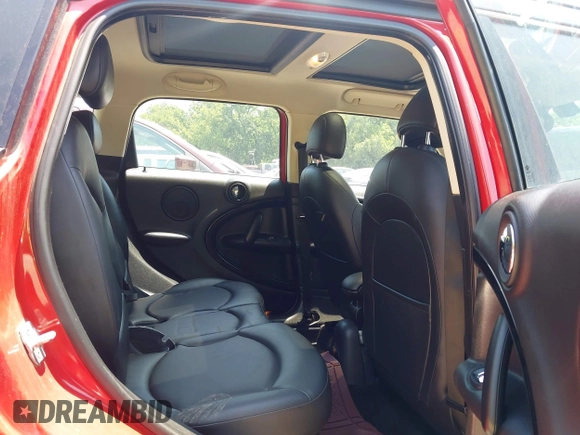 2013 MINI Countryman S with VIN WMWZC3C58DWP24865, listed as a IAAI auction lot 42386463 with 100,612 mi miles and . Bid and sale history available at DreamBid. Image 8.