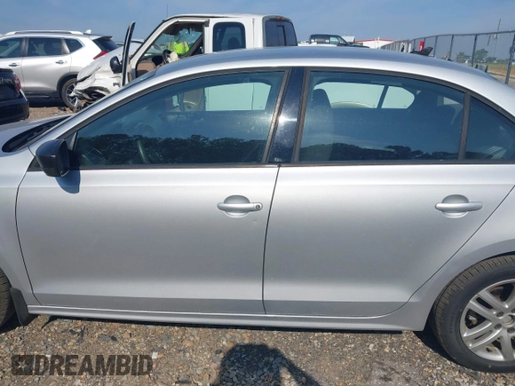 2015 Volkswagen Jetta S with VIN 3VW2K7AJ5FM251943, listed as a IAAI auction lot 42482891 with 74,649 mi miles and . Bid and sale history available at DreamBid. Image 14.