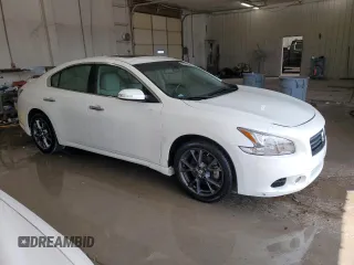 2014 Nissan Maxima SV z VIN 1N4AA5AP7EC915563, wystawiony jako Copart lot #58581365 z przebiegiem 32 347 mil mil oraz Szkoda całkowita • Salvage title. Historia ofert i sprzedaży dostępna na DreamBid. Obrazek 4.