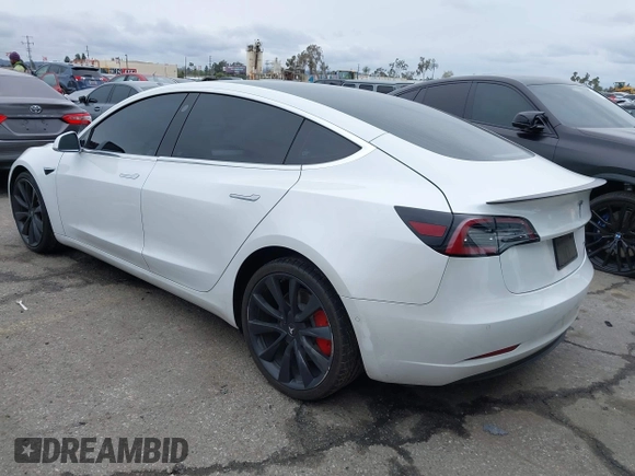 2020 Tesla Model 3 Performance z VIN 5YJ3E1EC4LF625109, wystawiony jako IAAI lot #41735149 z przebiegiem 95 010 mil mil oraz . Historia ofert i sprzedaży dostępna na DreamBid. Obrazek 3.