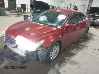 2016 Nissan Altima 2.5 S with VIN 1N4AL3AP7GN385617, listed as a IAAI auction lot 41317018 with 112,238 mi miles. Bid and sale history available at carsss.com. Image 2.