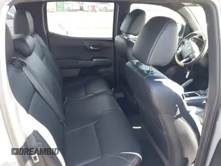 2019 Toyota Tacoma SR with VIN 3TMCZ5AN7KM213537, listed as a IAAI auction lot 42442068 with 39,969 mi miles and . Bid and sale history available at DreamBid. Image 8.