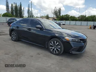 2024 Honda Civic EX-L z VIN 19XFL1H74RE001908, wystawiony jako Copart lot #58576135 z przebiegiem 31 455 mil mil oraz Tytuł czysty. Historia ofert i sprzedaży dostępna na DreamBid. Obrazek 4.