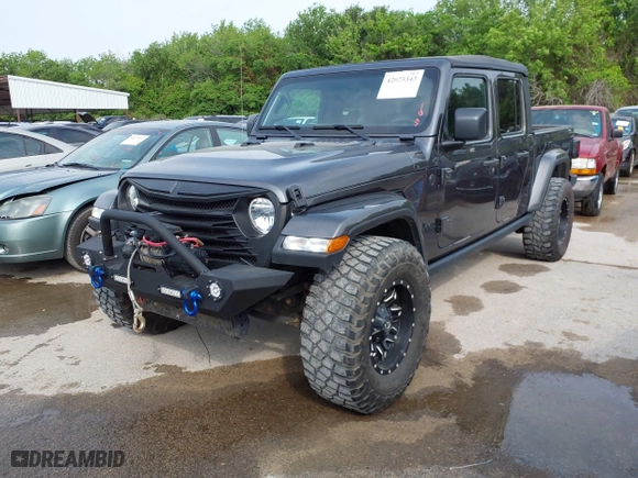 2022 Jeep Gladiator Texas Trail with VIN 1C6HJTAG0NL143489, listed as a IAAI auction lot 42073343 with 75,835 mi miles. Bid and sale history available at carsss.com. Image 17.