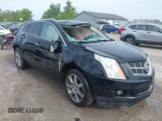 2012 Cadillac SRX Performance Collection with VIN 3GYFNEE32CS596327, listed as a IAAI auction lot 42343005 with 149,715 mi miles and . Bid and sale history available at DreamBid. Image 1.