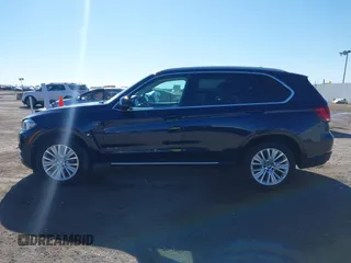 2016 BMW X5 sDrive35i with VIN 5UXKR2C55G0R71330, listed as a IAAI auction lot 41661140 with 128,457 mi miles. Bid and sale history available at carsss.com. Image 14.