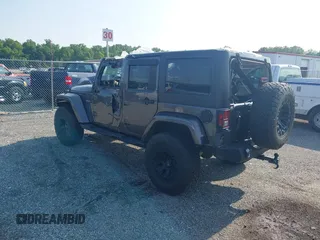 2016 Jeep Wrangler Unlimited Sport with VIN 1C4BJWDG9GL211030, listed as a IAAI auction lot 42459945 with 61,671 mi miles and . Bid and sale history available at DreamBid. Image 3.
