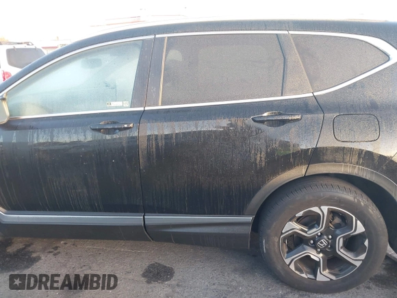 2019 Honda CR-V Touring with VIN 7FARW2H9XKE012394, listed as a IAAI auction lot 41092564 with 49,527 mi miles and . Bid and sale history available at DreamBid. Image 14.