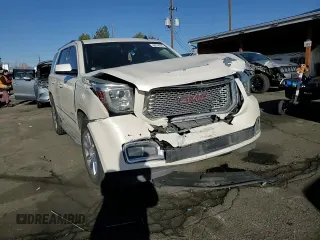2015 GMC Yukon Denali with VIN 1GKS2CKJ7FR183710, listed as a Copart auction lot 49074135 with 230,526 mi miles and Salvage Title. Bid and sale history available at carsss.com. Image 12.