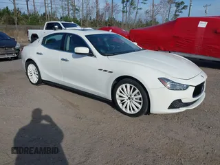 2015 Maserati Ghibli with VIN ZAM57XSA6F1156252, listed as a IAAI auction lot 41530186 with 84,417 mi miles. Bid and sale history available at carsss.com. Image 1.