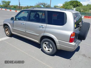 2002 Suzuki XL-7 with VIN JS3TY92V724105263, listed as a IAAI auction lot 41858262 with 103,249 mi miles. Bid and sale history available at carsss.com. Image 3.