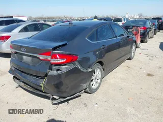 2017 Ford Fusion S with VIN 3FA6P0G72HR140903, listed as a IAAI auction lot 41782272 with 180,064 mi miles. Bid and sale history available at carsss.com. Image 4.
