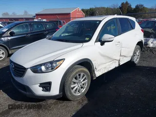 2016 Mazda CX-5 Touring with VIN JM3KE4CYXG0917841, listed as a IAAI auction lot 41420641 with 75,710 mi miles. Bid and sale history available at carsss.com. Image 2.