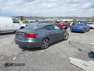 2018 Nissan Maxima SV with VIN 1N4AA6APXJC384102, listed as a IAAI auction lot 41907089 with 91,321 mi miles and . Bid and sale history available at DreamBid. Image 4.