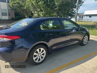 2021 Toyota Corolla LE with VIN JTDEPMAE3MJ123908, listed as a Copart auction lot 55230335 with 50,069 mi miles and Clean Title. Bid and sale history available at DreamBid. Image 4.