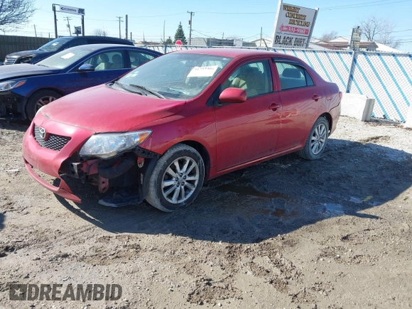 2009 Toyota Corolla with VIN JTDBL40E29J017537, listed as a IAAI auction lot 41757305 with 154,170 mi miles. Bid and sale history available at carsss.com. Image 2.