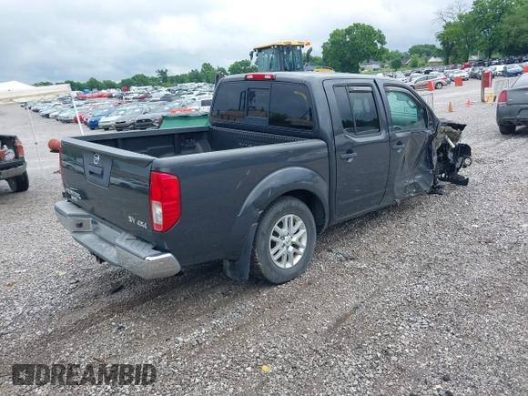 2015 Nissan Frontier SL with VIN 1N6AD0EV1FN764719, listed as a IAAI auction lot 42512771 with 104,572 mi miles and . Bid and sale history available at DreamBid. Image 4.