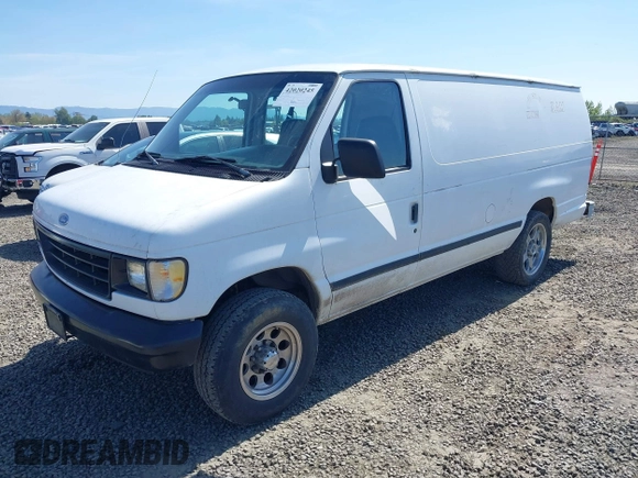 1996 Ford Econoline Cargo with VIN 1FTFS24Y3THA40644, listed as a IAAI auction lot 42020245 with 218,451 mi miles and . Bid and sale history available at DreamBid. Image 2.