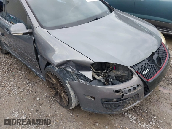 2009 Volkswagen GTI z VIN WVWHV71K79W109174, wystawiony jako IAAI lot #41327836 z przebiegiem 192 645 mil mil oraz . Historia ofert i sprzedaży dostępna na DreamBid. Obrazek 6.