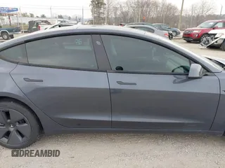 2023 Tesla Model 3 with VIN 5YJ3E1EA5PF474382, listed as a IAAI auction lot 41764268 with 31,040 mi miles and . Bid and sale history available at DreamBid. Image 12.