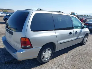 2003 Ford Windstar LX with VIN 2FMZA51463BB80988, listed as a IAAI auction lot 42191972 with 205,338 mi miles and . Bid and sale history available at carsss.com. Image 4.