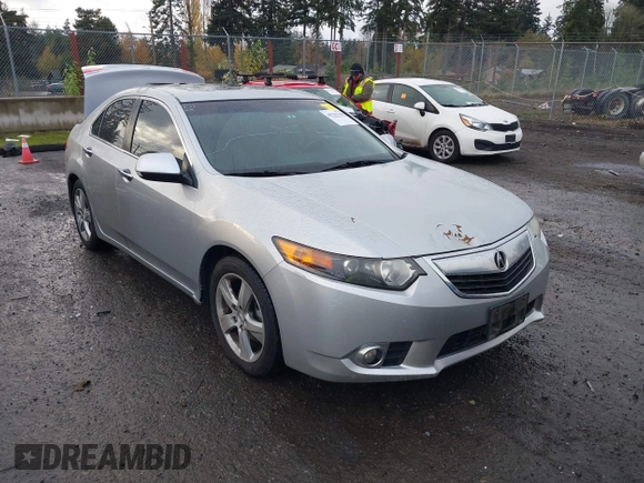 2012 Acura TSX Tech Pkg with VIN JH4CU2F62CC012290, listed as a IAAI auction lot 40765338 with 129,737 mi miles. Bid and sale history available at carsss.com. Image 1.