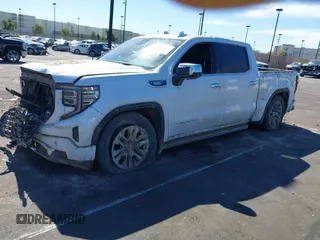 2022 GMC Sierra 1500 with VIN 3GTUUGETXNG640009, listed as a IAAI auction lot 41626847 with 43,537 mi miles and . Bid and sale history available at DreamBid. Image 2.