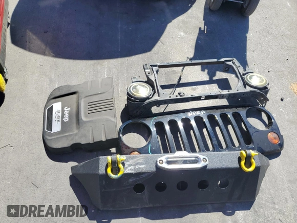 2013 Jeep Wrangler Unlimited Rubicon 10th Anniversary with VIN 1C4HJWFG4DL550832, listed as a Copart auction lot 71633684 with 60,759 mi miles and Salvage title. Bid and sale history available at DreamBid. Image 12.