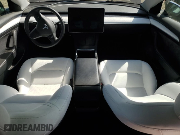 2023 Tesla Model 3 z VIN 5YJ3E1EA5PF547556, wystawiony jako Copart lot #52799655 z przebiegiem 5 242 mil mil oraz Szkoda całkowita • Salvage title. Historia ofert i sprzedaży dostępna na DreamBid. Obrazek 8.