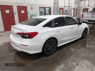 2023 Honda Civic Sport z VIN 2HGFE2F51PH517583, wystawiony jako IAAI lot #41986930 z przebiegiem 42 604 mil mil oraz . Historia ofert i sprzedaży dostępna na DreamBid. Obrazek 4.