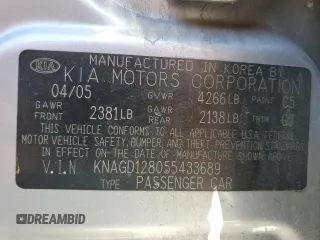 2005 Kia Optima LX z VIN KNAGD128055433689, wystawiony jako Copart lot #46909305 z przebiegiem 27 609 mil mil oraz Szkoda całkowita • Salvage title. Historia ofert i sprzedaży dostępna na DreamBid. Obrazek 12.