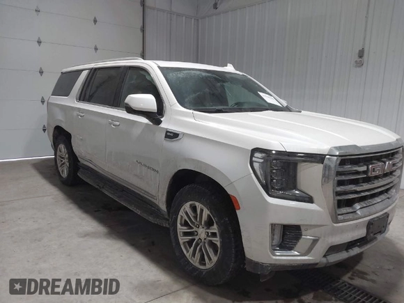 2021 GMC Yukon XL SLT with VIN 1GKS2GKD4MR414318, listed as a IAAI auction lot 41590618 with 49,913 mi miles. Bid and sale history available at carsss.com. Image 1.