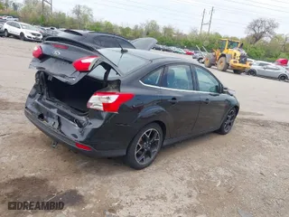 2012 Ford Focus Titanium with VIN 1FAHP3J2XCL369554, listed as a IAAI auction lot 42072931 with 95,474 mi miles. Bid and sale history available at carsss.com. Image 4.