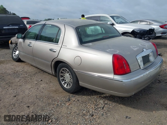 2001 Lincoln Town Car Signature with VIN 1LNHM82W21Y684197, listed as a IAAI auction lot 41944429 with 159,297 mi miles and . Bid and sale history available at DreamBid. Image 3.