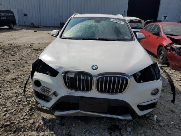 2017 BMW X1 xDrive28i z VIN WBXHT3C35H5F86099, wystawiony jako Copart lot #60196275 z przebiegiem 61 117 mil mil oraz Szkoda całkowita • Salvage title. Historia ofert i sprzedaży dostępna na DreamBid. Obrazek 5.
