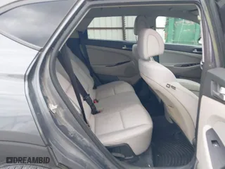 2017 Hyundai Tucson SE with VIN KM8J23A45HU593761, listed as a IAAI auction lot 41885334 with 198,658 mi miles. Bid and sale history available at carsss.com. Image 8.