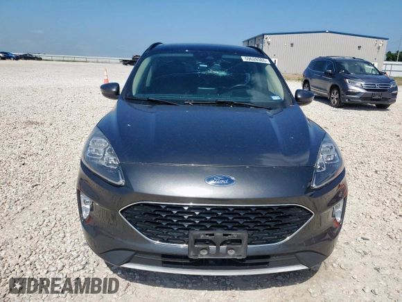 2020 Ford Escape Titanium Hybrid z VIN 1FMCU0DZ1LUC38345, wystawiony jako Copart lot #59628985 z przebiegiem 86 917 mil mil oraz Szkoda całkowita • Salvage title. Historia ofert i sprzedaży dostępna na DreamBid. Obrazek 5.