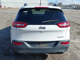2016 Jeep Cherokee Sport with VIN 1C4PJLAS5GW207990, listed as a IAAI auction lot 41230521 with 253,524 mi miles and . Bid and sale history available at DreamBid. Image 16.