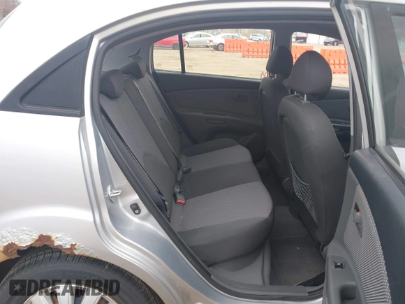 2009 Kia Rio LX with VIN KNADE243596544181, listed as a IAAI auction lot 41876733 with 200,216 mi miles. Bid and sale history available at carsss.com. Image 8.