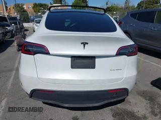2023 Tesla Model Y Long Range with VIN 7SAYGDEEXPA152986, listed as a IAAI auction lot 41946665 with 13,574 mi miles and . Bid and sale history available at carsss.com. Image 16.