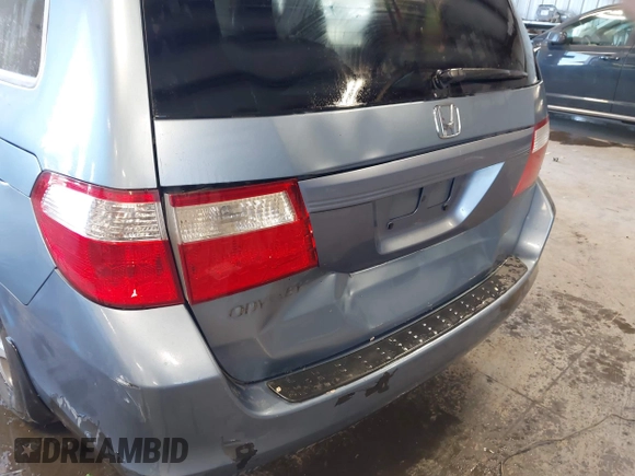 2007 Honda Odyssey EX-L z VIN 5FNRL38617B078923, wystawiony jako IAAI lot #42335122 z przebiegiem 154 352 mil mil oraz . Historia ofert i sprzedaży dostępna na DreamBid. Obrazek 6.