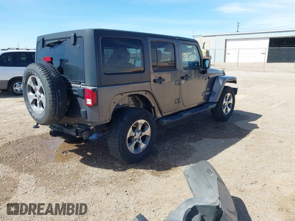 2017 Jeep Wrangler Unlimited Sahara with VIN 1C4BJWEG7HL641347, listed as a IAAI auction lot 41833356 with 84,735 mi miles. Bid and sale history available at carsss.com. Image 4.